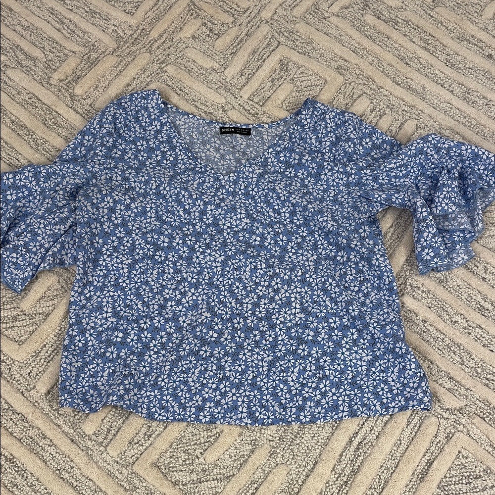 Flouncy light blue floral top